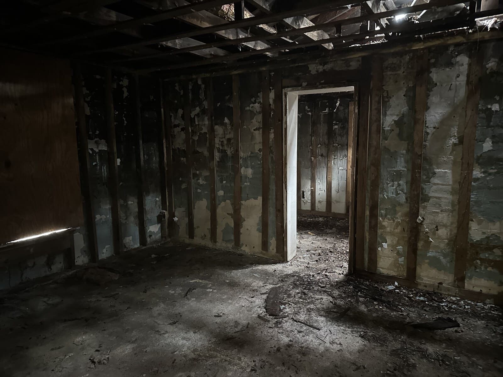 Gutted living room before renovation