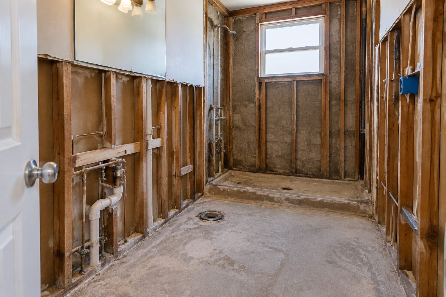 Gutted bathroom down to studs in Miami
